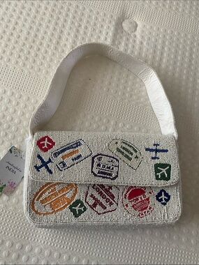 White Beaded Shoulder Bag with Travel Patch Embroidery